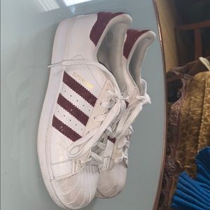 Maroon and gold faux snakeskin superstars